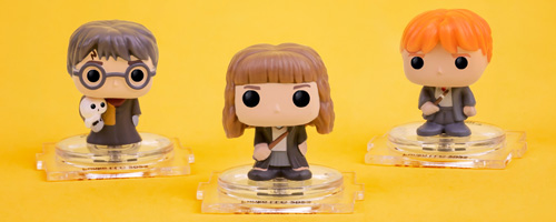 Yellow Gold background featuring Funko Bitty POP! Harry Potter collection